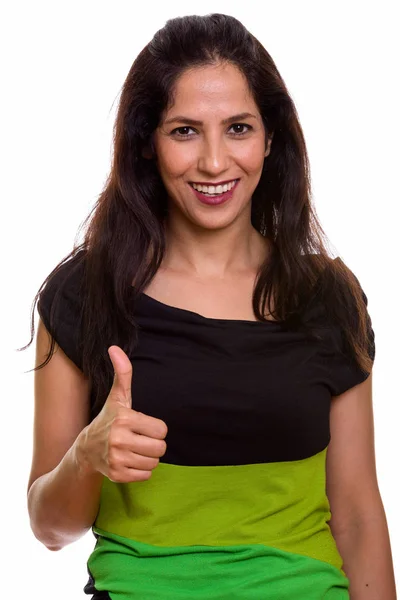 Estudio de tiro de la mujer persa feliz sonriendo mientras que da el pulgar hacia arriba — Foto de Stock