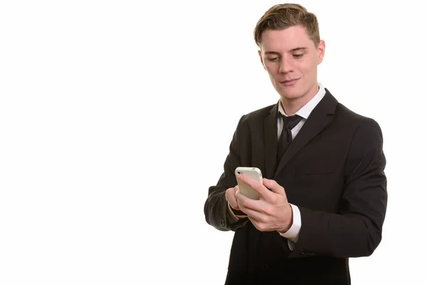 Jovem bonito homem de negócios caucasiano usando telefone celular — Fotografia de Stock