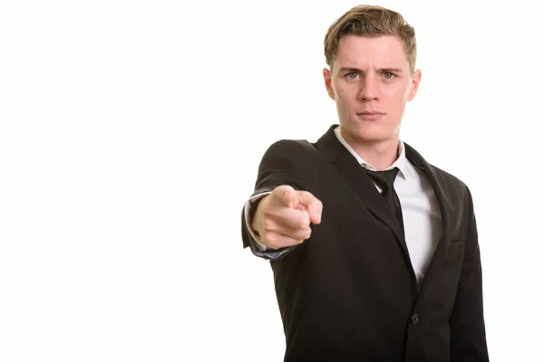 Young handsome Caucasian businessman pointing finger to camera — Stock Photo, Image