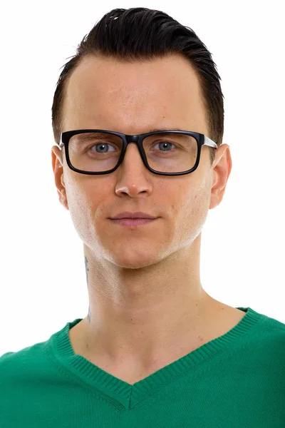 Egy fiatal, jóképű férfi arca szemüvegben. — Stock Fotó