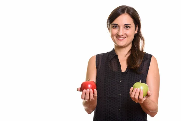 Boldog szép nő mosolyogva, miközben tartja a piros és a zöld alma — Stock Fotó