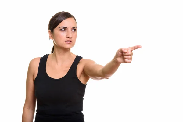 Estudio de la foto de la hermosa mujer mirando enojado mientras que señala fing — Foto de Stock