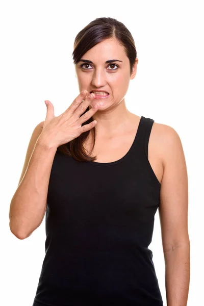 Studio shot van mooie vrouw op zoek schuldig terwijl denken — Stockfoto