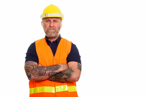 Mature bearded man construction worker with hand tattoos with ar — Stock Photo, Image