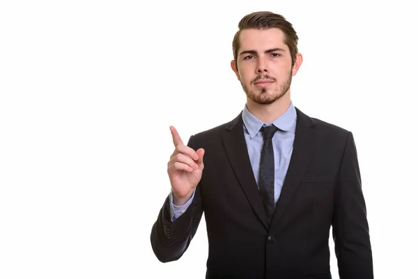Junger hübscher kaukasischer Geschäftsmann zeigt mit dem Finger nach oben — Stockfoto