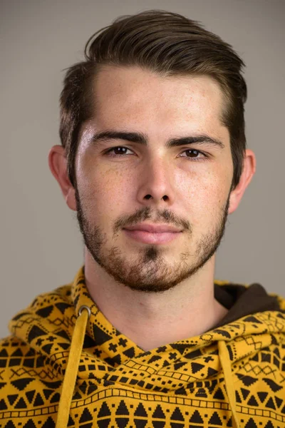 Face of young handsome Caucasian man — Stock Photo, Image