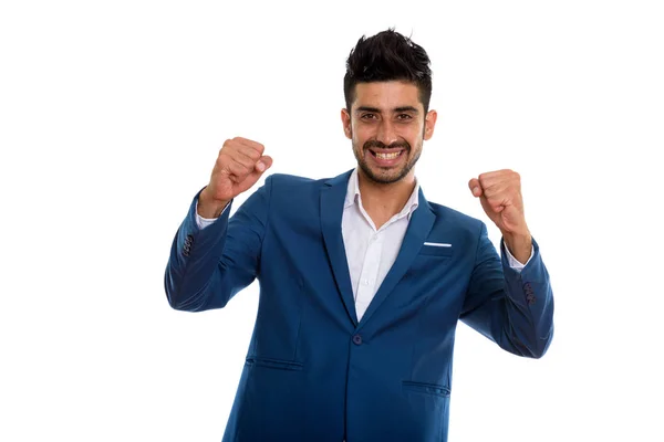 Studio záběr mladých šťastný perský podnikatel usmívající se přitom loo — Stock fotografie