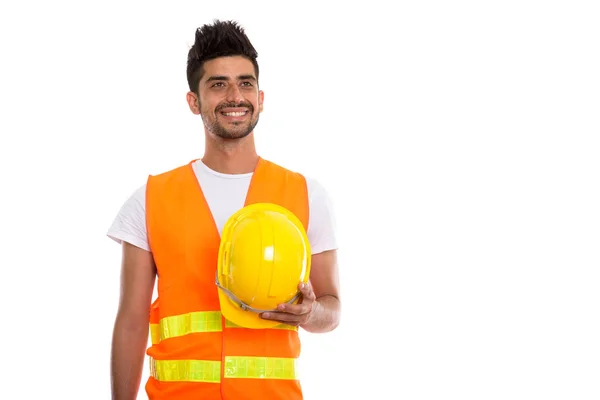 Pensativo feliz hombre persa trabajador de la construcción sonriendo mientras h — Foto de Stock