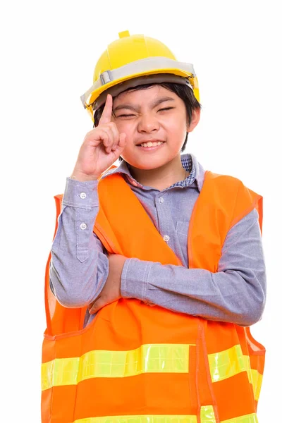 Gelukkig Japanse jongen bouwvakker glimlachen terwijl aanwijsapparaat fi — Stockfoto