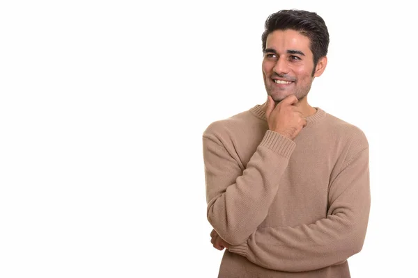 Mladý šťastný perský muž myšlení — Stock fotografie