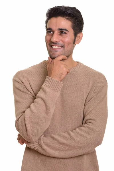 Mladý šťastný perský muž myšlení — Stock fotografie