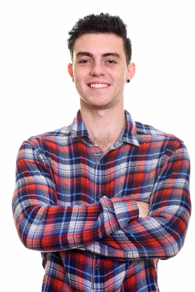 Studio shot of young man with arms crossed — Stock Photo, Image