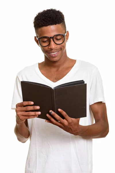 Young happy African man reading book — Stock Photo, Image