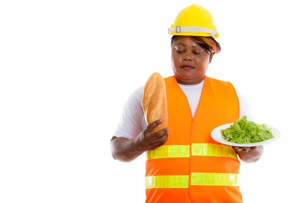 Estudio shot de gorda negra africana mujer construcción trabajador looki — Foto de Stock