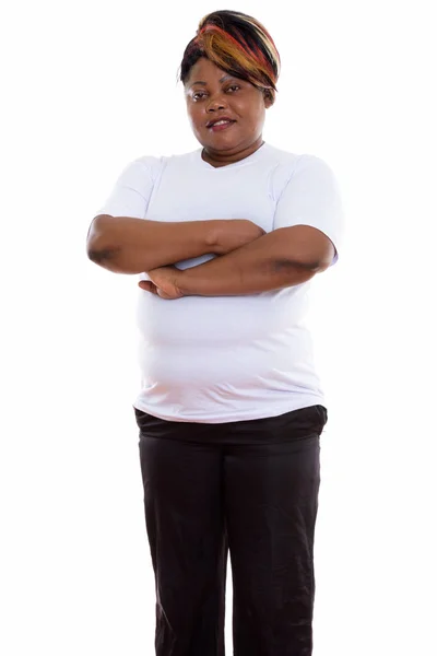 Studio shot of happy fat black African woman smiling and standin — Stock Photo, Image