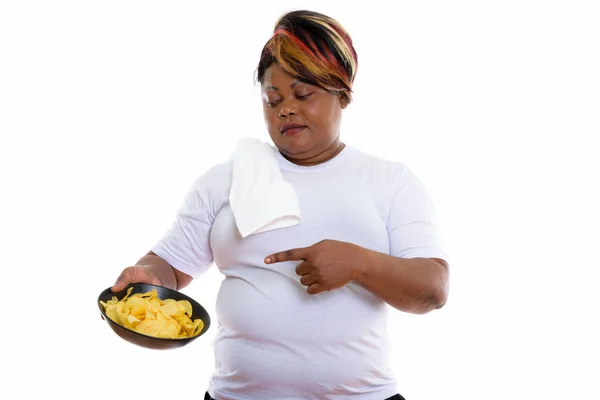 Strzał studio tłuszczu Czarny Kobieta Afrykańska gospodarstwa i wskazując na b — Zdjęcie stockowe