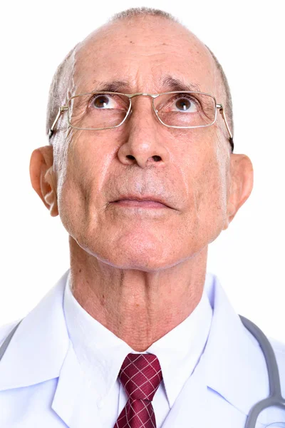 A vezető férfi orvos arca gondolkodás — Stock Fotó