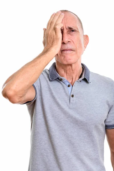 Studio colpo di uomo anziano cercando stressato — Foto Stock