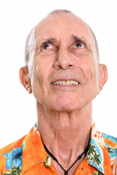 Gesicht eines glücklichen Seniors, der lächelt und denkt — Stockfoto
