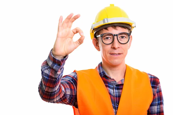 Studio shot of man construction worker giving ok sign — Stock Photo, Image