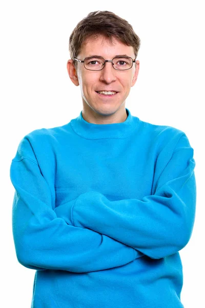 Estudio de tiro de hombre feliz sonriendo mientras llevaba gafas con un — Foto de Stock