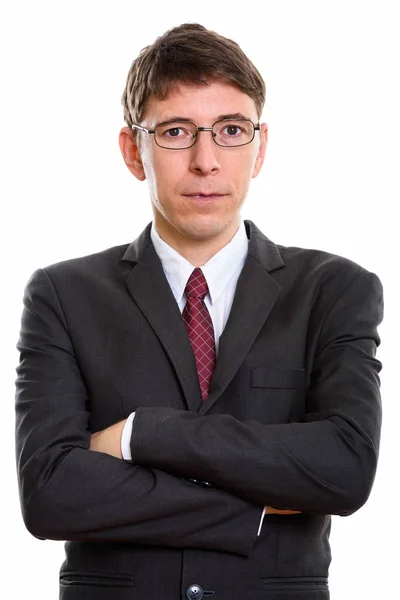 Studio shot di uomo d'affari che indossa occhiali con le braccia incrociate — Foto Stock