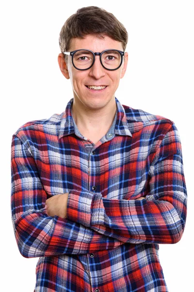 Studioaufnahme eines glücklichen Mannes, der lächelt, während er eine Brille mit einem — Stockfoto