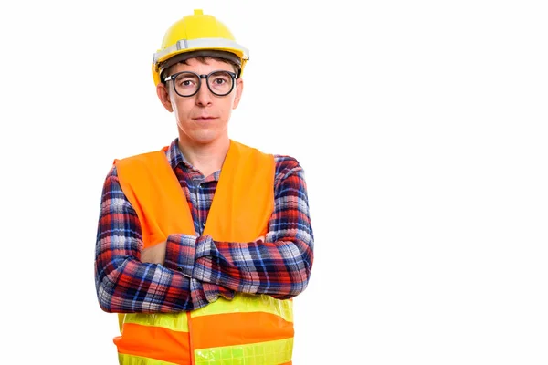 Studio shot of man construction worker with arms crossed — Stock Photo, Image