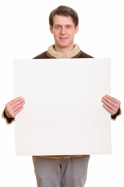 Happy handsome Caucasian man holding copyspace — Stock Photo, Image