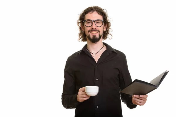 Gelukkig knappe blanke man met boek en koffiekop — Stockfoto