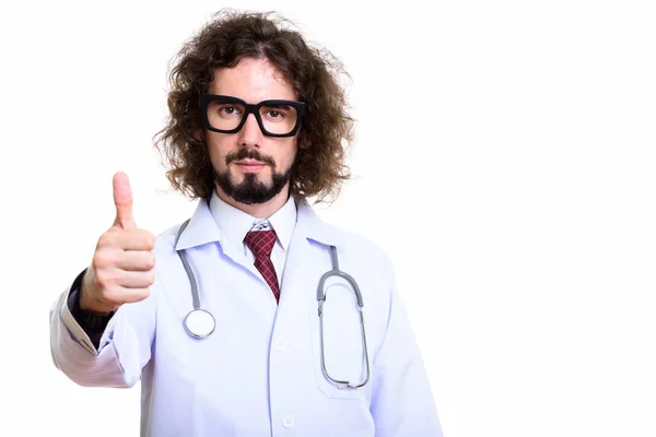Studio záběr pohledný muž lékař dávat palec nahoru — Stock fotografie
