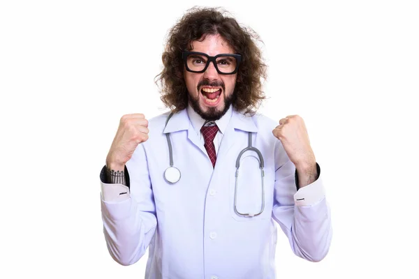 Студийный снимок счастливого человека доктор улыбается глядя взволнован — стоковое фото