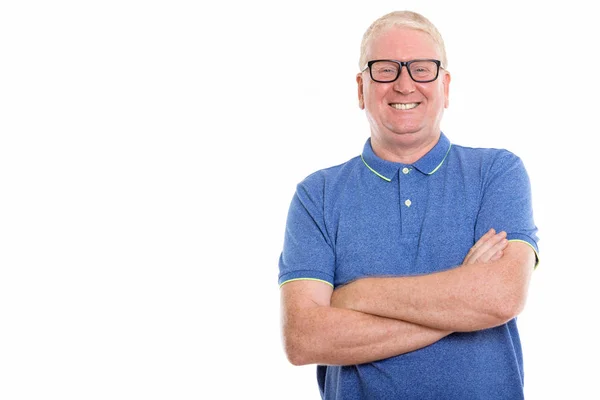 Studio shot of happy mature man smiling while wearing eyeglasses — Stock Photo, Image