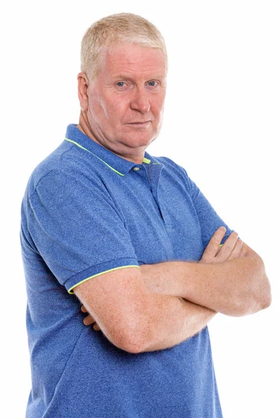 Studio shot of mature man with arms crossed — Stock Photo, Image
