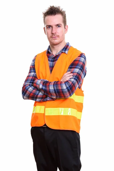 Studio shot of man construction worker standing with arms crosse — Stock Photo, Image