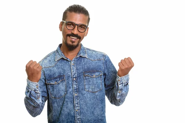 Young happy Indian man looking motivated — Stock Photo, Image