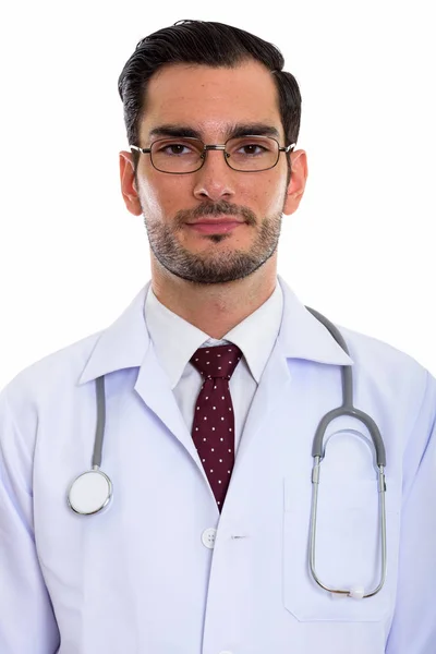 Studio shot de jeune homme beau médecin portant des lunettes — Photo