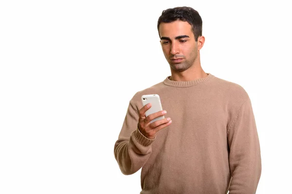 Young handsome Caucasian man using mobile phone — Stock Photo, Image
