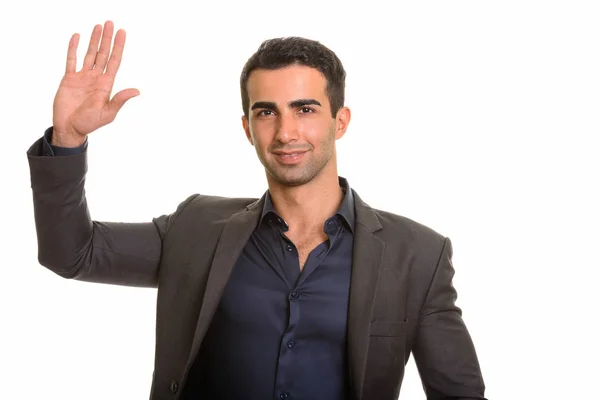 Jovem feliz homem de negócios caucasiano acenando mão — Fotografia de Stock