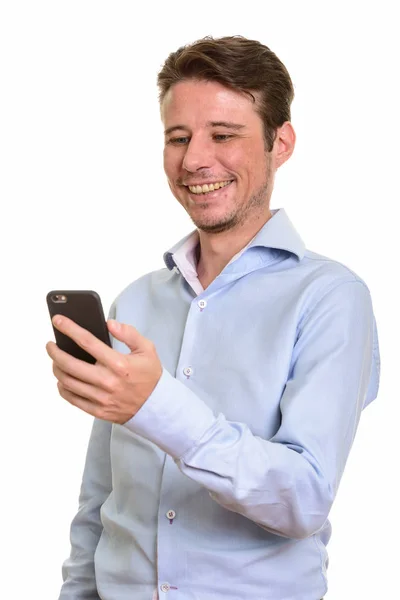 Happy kavkazských podnikatel drží mobilní telefon — Stock fotografie