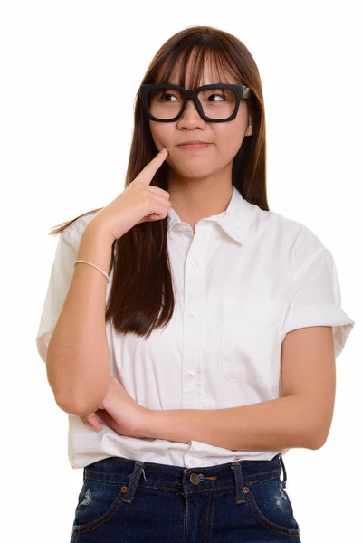 Jovem bonito Asiático adolescente menina pensando — Fotografia de Stock