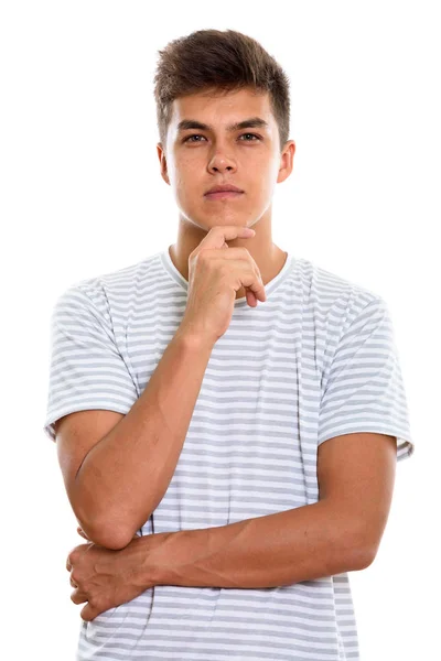 Estudio de un joven guapo pensando con la mano en la barbilla — Foto de Stock