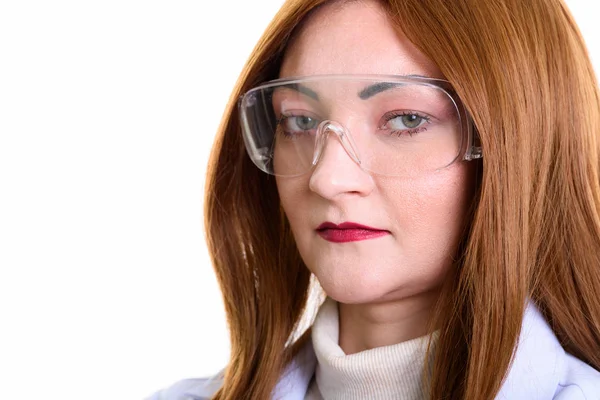 Close up of woman doctor wearing protective glasses — Stock Photo, Image