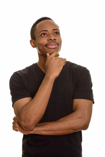 Jovem e bonito homem africano pensando — Fotografia de Stock