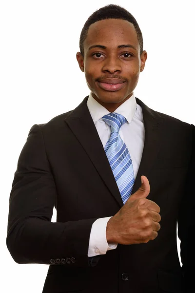 Young African businessman giving thumb up — Stock Photo, Image