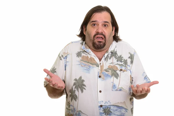 Fat Caucasian man looking confused with both arms raised — Stock Photo, Image