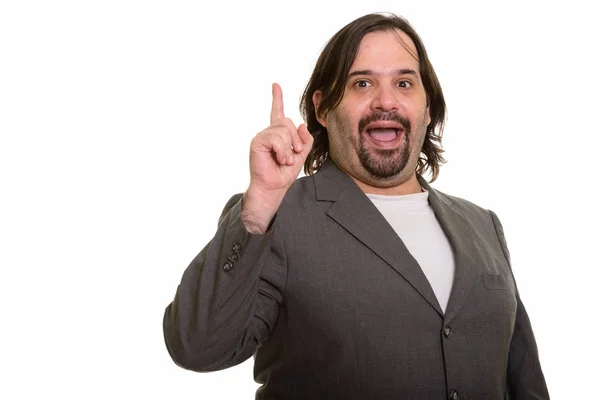 Feliz gordo caucásico hombre de negocios sonriendo y señalando el dedo hacia arriba — Foto de Stock