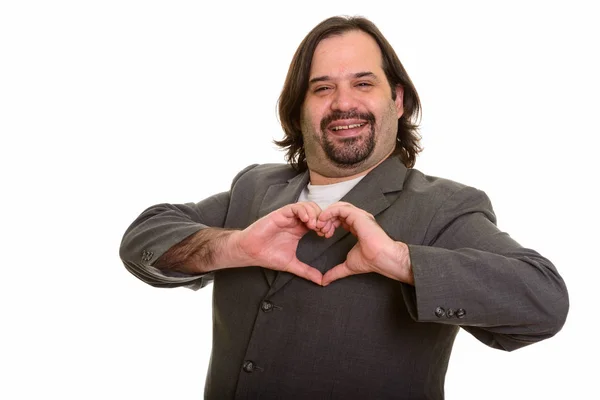 Glückliche dicke kaukasische Geschäftsmann lächelnd macht Hand Herz Zeichen — Stockfoto
