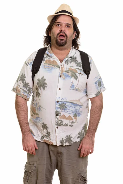 Fat Caucasian man looking shocked ready for vacation — Stock Photo, Image