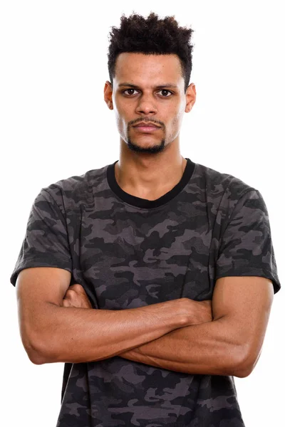 Studio shot of young African man with arms crossed — Stock Photo, Image
